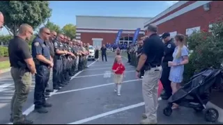 A daughter of fallen Tennessee officer was escorted to kindergarten by her father's coworkers