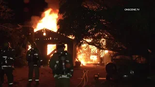 Police Officers Discover House Engulfed In Flames In Pacoima