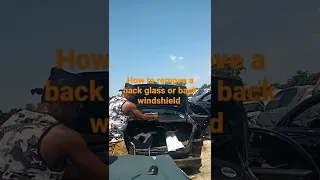 removing a back glass or back windshield at the junk yard