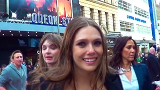 ELIZABETH OLSEN (Scarlet Witch) signs a SHIELD for Children's Charity (SIGNED by 20 Marvel heroes)