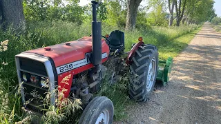 Massey Ferguson 235 cutting grass with John Deere flail mower.