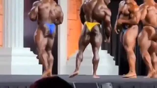 Phil Heath taunts at Brandon Curry's Legs during Olympia Prejudging 2020.