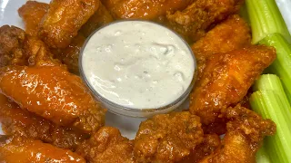 Tasty Buffalo Wings with Homemade Blue Cheese Sauce