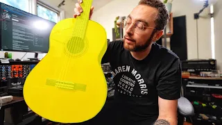 The Only Guitar EVERYONE Should Have (the couch guitar)