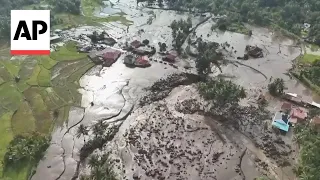 Flash floods and cold lava flow hit Indonesia’s Sumatra island, causing numerous deaths