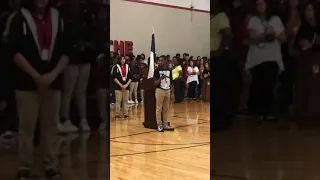 Singing the national Anthem at school pep rally {Jerard Mosley}