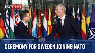 Watch flag raising ceremony at NATO in Brussels for Sweden's accession to alliance