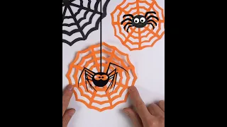 Halloween origami. Paper spider web.