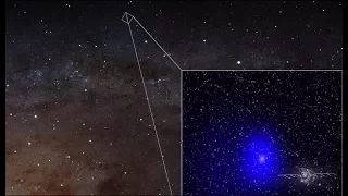 Giant black hole pair photobombs Andromeda galaxy