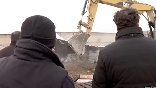 Bulldozers Roll Into Georgian Shantytown As Residents Look On