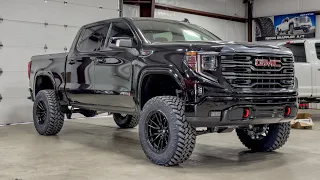 2023 GMC AT4 with 4” Zone lift on 20x10s/35” trails