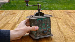The old 19th century coffee grinder has been beautifully restored.