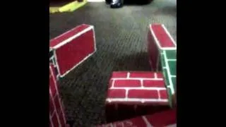 Vinny, Ricky, and Bubba knock down towers with cars