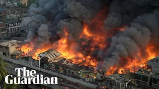 'It's all over': huge fire rips through Dhaka clothing market