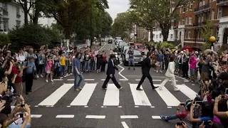 Beatles' Abbey Road crossing packed for 45th anniversary