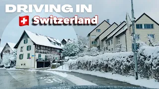🇨🇭Driving In Winter Wonderland Switzerland 4k | Roadtrip in Zurich , Snowing April !