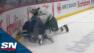 Jets' Stanley drops glove with Wild's Middleton after collision on Scheifele