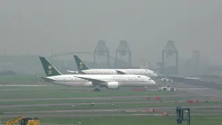 Two Saudia 787s cross the runway at Tokyo Haneda