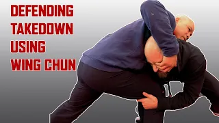 Defending a takedown using wing chun | Master Wong