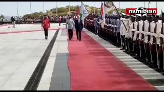 Finnish president Sauli Niinistö inspects a guard of honour during a visit in Windhoek