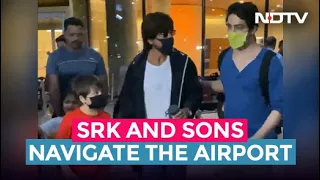 Shah Rukh Khan Navigates Mumbai Airport With Sons Aryan And AbRam
