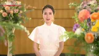 May J.  sings "Flowers Will Bloom" in English