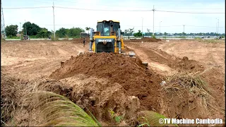 Stronger and techniques dozer cutting slope and pushing stone making new road