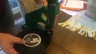 Record Dinking machine cut large hole in 7inch record for jukebox play