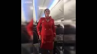 Football Fans distracting the air hostess during safety announcement [Funny]