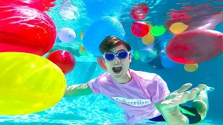 SWIMMING WITH GIANT WATER BALLOONS!! (UNDERWATER)