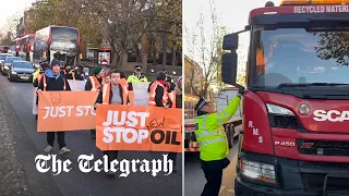 Just Stop Oil: Angry drivers shout at police as they walk alongside activists