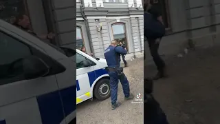 Turku, Finland. Finnish trained police are arresting one fliphead. Submachine gun as support weapon.