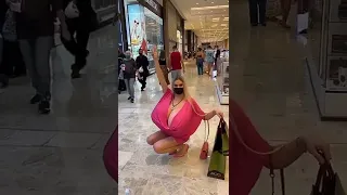 Woman with the biggest boobs in the world cause commotions on the street with her goodies watch.