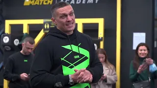 Oleksandr Usyk speak with children for boxing