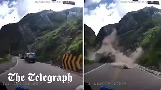 Moment lorry driver narrowly escapes being crushed by avalanche of giant boulders