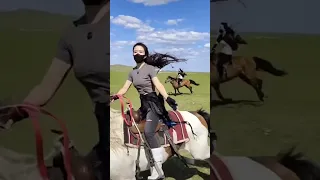 Buryat girls on horseback. Shenekhen, Hulunbuir, China.