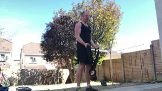 Banded kettlebell bicep curl demo