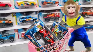 Baby Monkey KiKi goes shopping to buy cars at the supermarket | KUDO ANIMAL