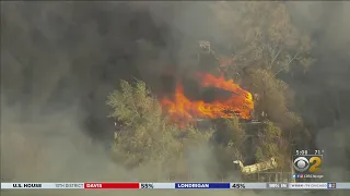 Brush Fire Rages Along I-80/94 In Gary, Indiana