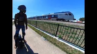 Electric Unicycle Races 70MPH Train!!!