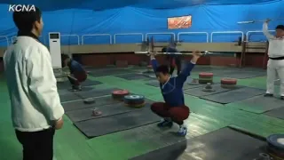 North Korean Weightlifters Sports Drinks Advertisement